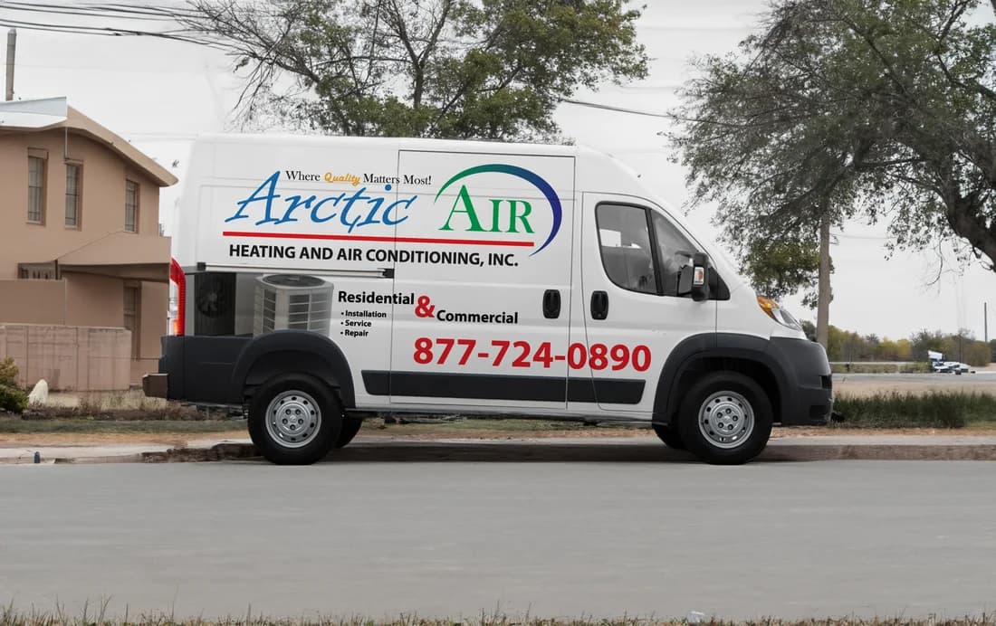 Old Arctic Air Heating and Air Conditioning van with outdated branding before WrapMasters rebrand