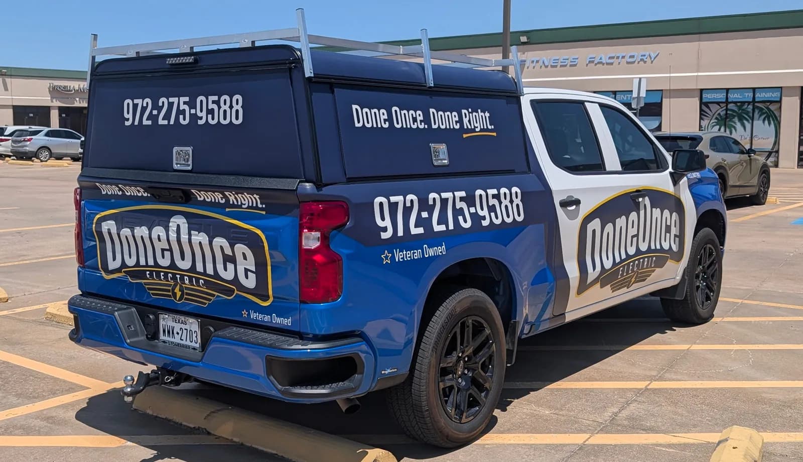 Done Once Electric full truck wrap with a clear hierarchy built around the company name