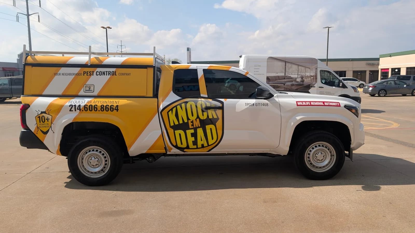 The same company after WrapMasters: the name in a single shield on the door, your neighborhood pest control company along the cap, and the phone number on the bed