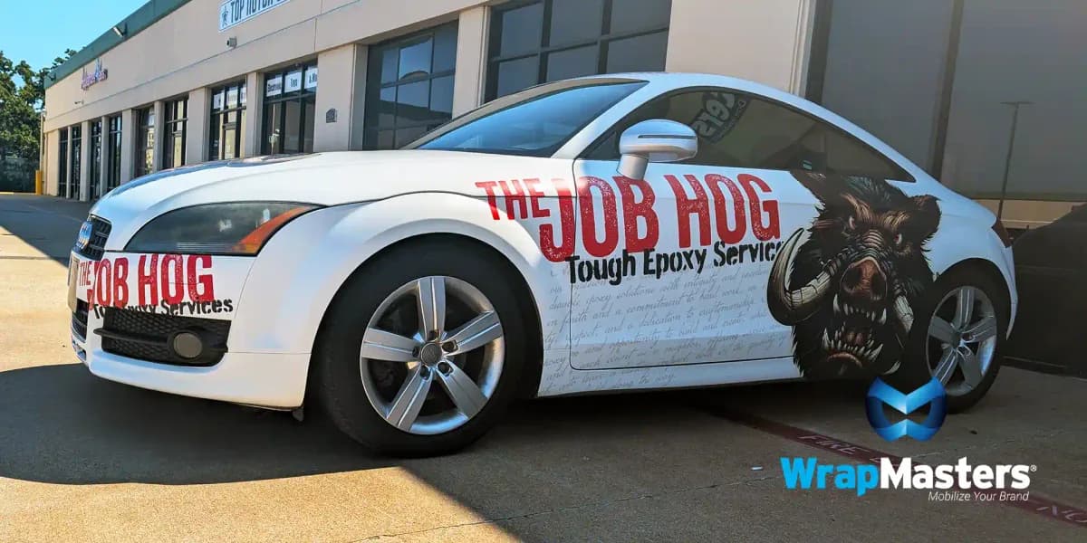 White Audi TT wrapped as The Job Hog with the hog graphic and Tough Epoxy Services branding