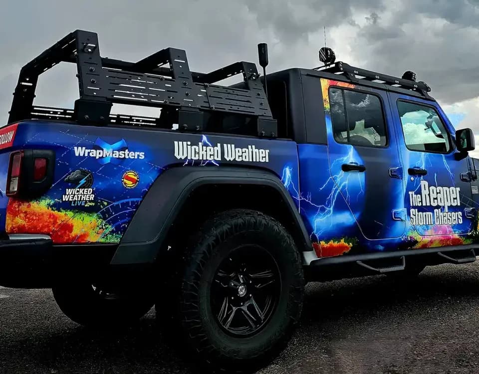 Wrapped Jeep Gladiator for a storm chaser in Denton by WrapMasters