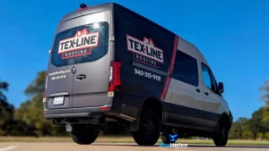 Black commercial van with red and white 