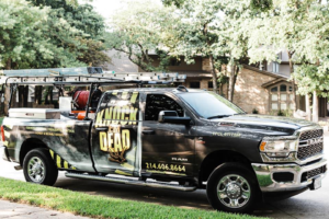 pest control truck before vehicle wrap showing low visibility and unclear branding